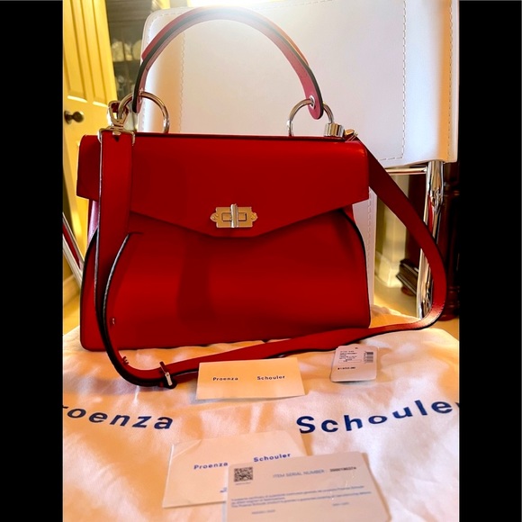 Proenza SchoulerDepth:4.75"
Strap 20"
Width:12.5"
Handle Drop:5.25"
Height:9.75” - Picture 1 of 10